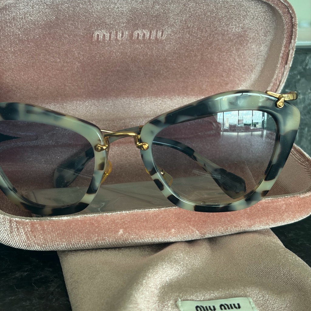 Miu Miu Tortoiseshell Sunglasses With Gold Accents